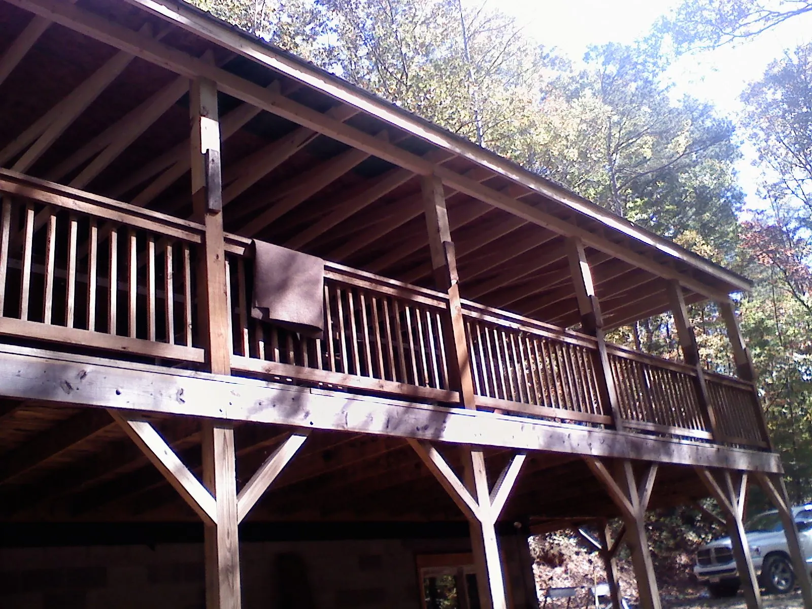 Timber framing under a new elevated porch and deck — Roof Leak Repair in Bourbonnais by Roofing Brothers